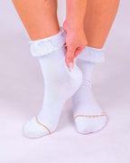 White padded lace socks worn on both feet
