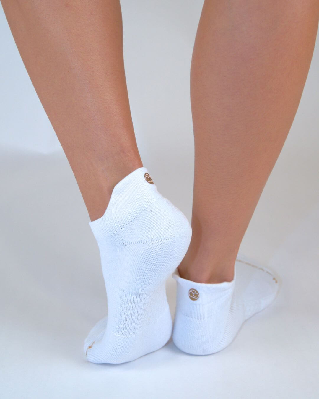 White Shezza unpadded ankle socks worn on both feet